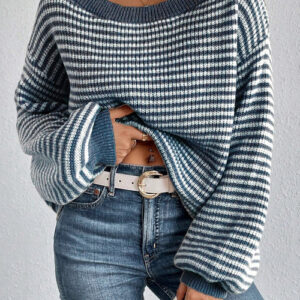 A cosy jumper with blue stripes, bell sleeves and dropped shoulders